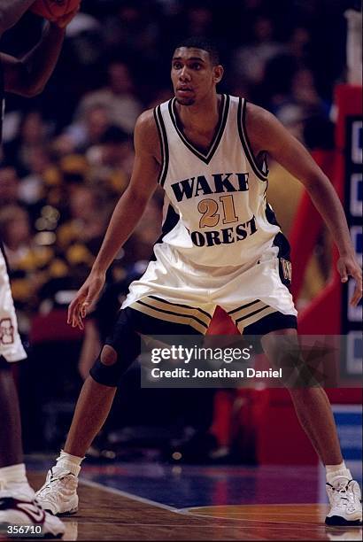 Center Tim Duncan of the Wake Forest Demon Deacons looks on during a game of the Great 8 Tournament against the Mississippi State Bulldogs at the...