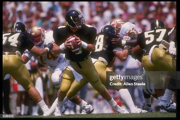 Quarterback Brett Favre of the Southern Mississippi Golden Eagles drops back to pass during the Golden Eagles 30-26 victory over the Florida State...