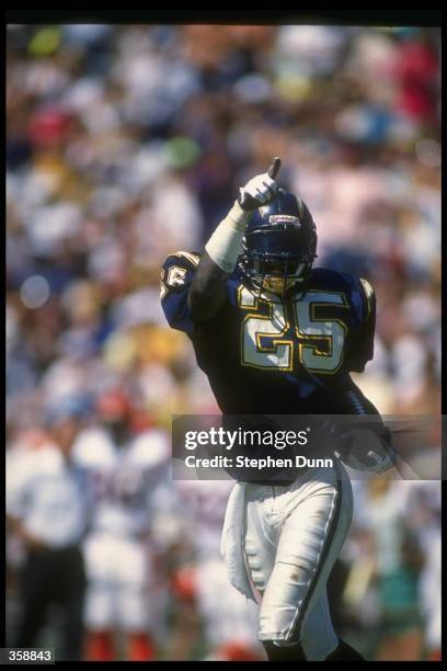 Defensive back Vencie Glenn of the San Diego Chargers celebrates after making an interception against the Cincinnati Bengals during a game at Jack...