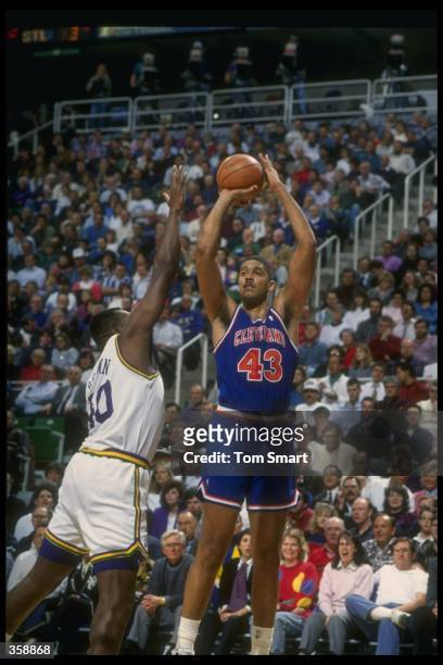 Center Brad Daugherty of the Cleveland Cavaliers prepares to shoot the ball during a game against the Utah Jazz at the Delta Center in Salt Lake...