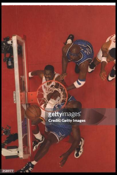 General view of a fight for the ball during Game Three of the NBA Finals between the Houston Rockets and the Orlando Magic at the Summit in Houston,...