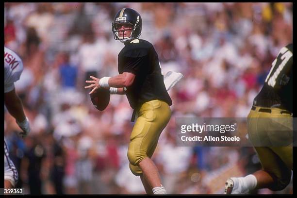 Quarterback Brett Favre of the Southern Mississippi Golden Eagles looks to pass from the pocket during the Golden Eagles 30-26 victory over the...