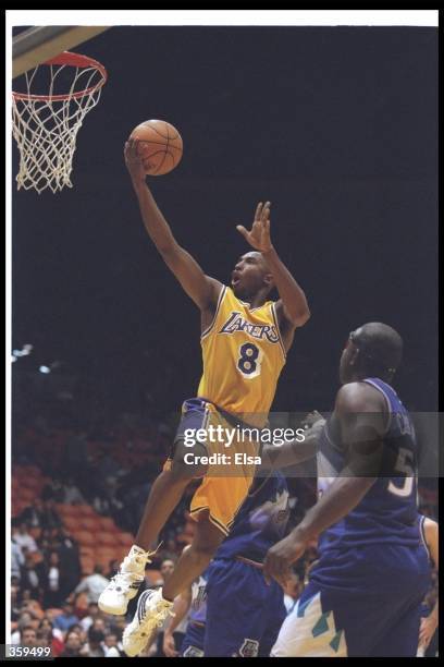 Guard Kobe Bryant of the Los Angeles Lakers goes up for two during a game against the Utah Jazz at the Great Western Forum in Inglewood, California....