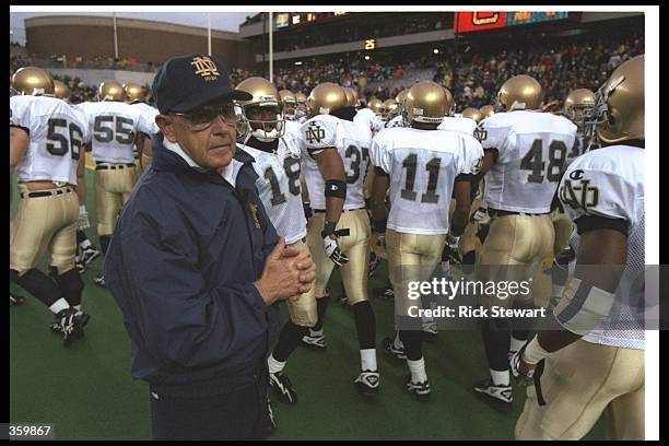 Notre Dame Fighting Irish head coach Lou Holtz looks on during a game against the Boston College Eagles at Alumni Stadium in Chestnut Hill,...