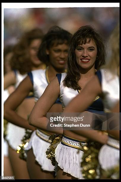 The San Diego Chargers cheerleaders look on during a game against the San Francisco 49ers at Jack Murphy Stadium in San Diego, California. The 49ers...
