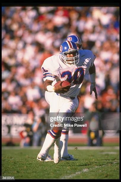 Running back Steve Sewell of the Denver Broncos moves the ball during a game against the Los Angeles Raiders at the Coliseum in Los Angeles,...