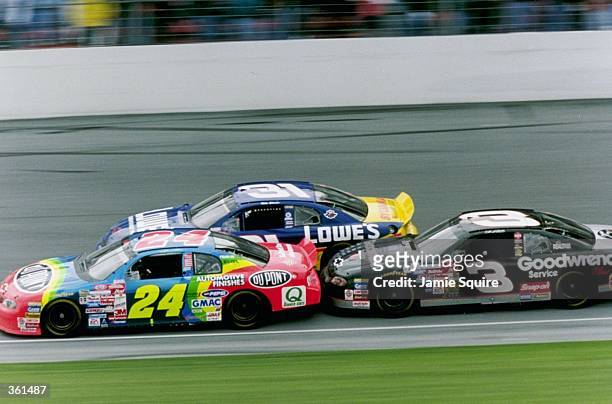 Jeff Gordon leads Dale Earnhardt and Mike Skinner during the NASCAR Daytona 500 at the Daytona International Speedway in Daytona, Florida.