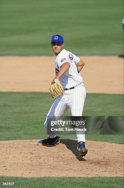 Pitcher Marc Pisciotta of the Chicago Cubs winds back to throw during the Spring Training game against the Arizona Diamondbacks at the HoHoKam Park...