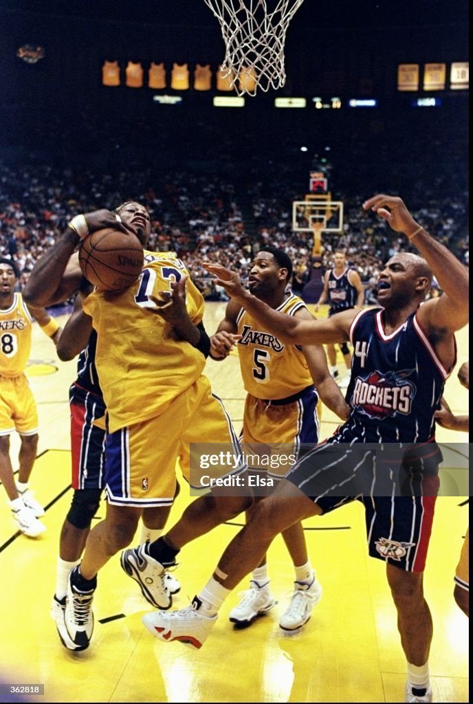 Rodman Lakers Rockets Dennis Rodman of the Los Angeles Lakers recovers the ball during the ...