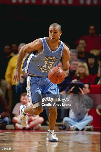 Ademola Okulaja of the North Carolina Tar Heels dribbles the ball during the game against the Maryland Terrapins at the Cole Field House in College...