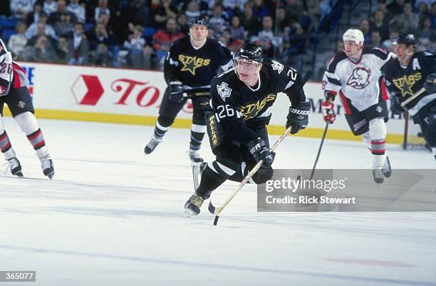 Jere Lehtinen of the Dallas Stars in action during the game against the Buffalo Sabres at the Marine Midland Arena in Buffalo, New York. The Sabres...