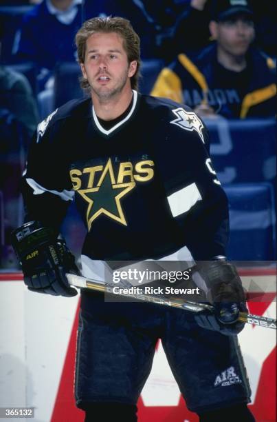 Mike Modano of the Dallas Stars looking on during warm ups before the game against the Buffalo Sabres at the Marine Midland Arena in Buffalo, New...