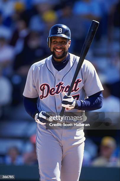 Tony Clark of the Detroit Tigers walks to the plate as he carries his bat during a Spring Training game against the Pittsburgh Pirates at the...