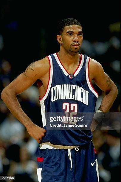 Richard Hamilton of the Connecticut Huskies looks on during the game against the Georgetown Hoyas at the MCI Center in Washington, D.C. The Huskies...