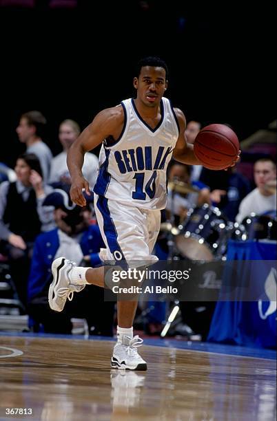 Shaheen Holloway of the Seton Hall Pirates dribbles during the game against the Georgetown Hoyas at the Continental Airlines Arena in East...