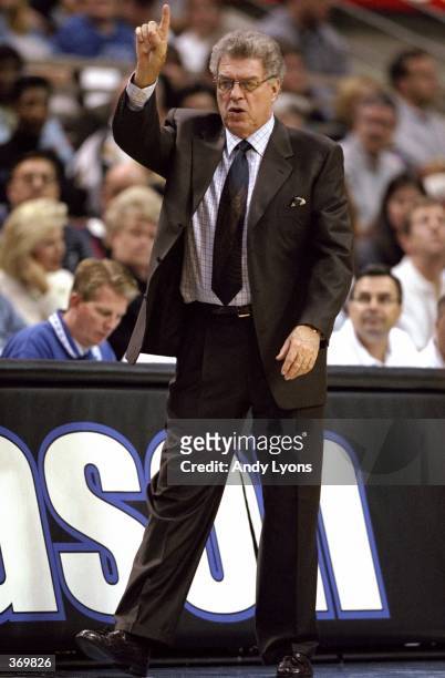 Head coach Chuck Daly of the Orlando Magic signals from the sidelines during the game against the Washington Wizards at the Orlando Arena in Orlando,...