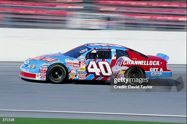 Kerry Earnhardt, races his car in a pre- qualifying heat of the Busch Grand National series during the Daytona Speedweek at the Daytona International...