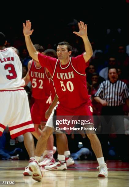 Alex Jensen of the Utah Runnin Utes guards during the game against the New Mexico Lobos at "The Pit" Bob King Court in Albuquerque, New Mexico. The...