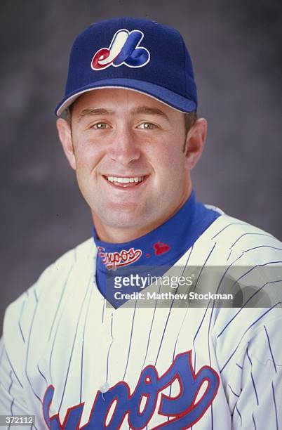 Catcher Brian Schneider of the Montreal Expos poses for a studio portrait on Photo Day during Spring Training at the Roger Dean Stadium in Jupiter,...