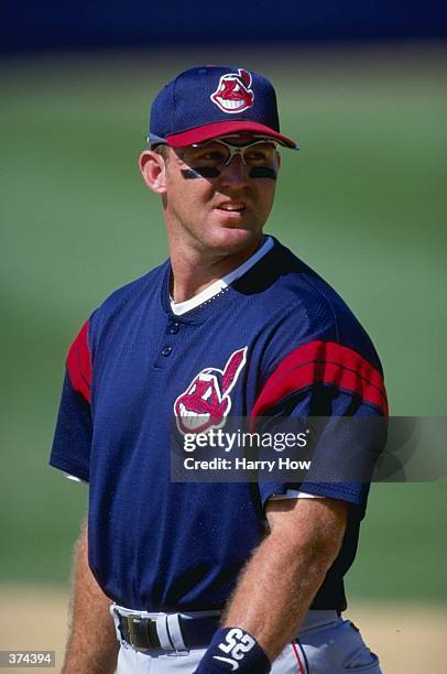 Infielder Jim Thome of the Cleveland Indians looks on during the Spring Training game against the Detroit Tigers at the Joker Marchant Stadium in...