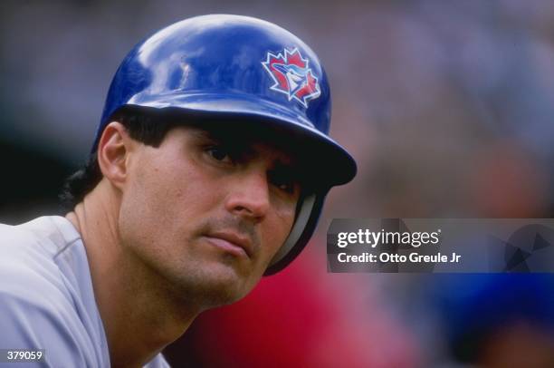 Outfielder Jose Canseco of the Toronto Blue Jays in action during a game against the Oakland Athletics at the Oakland Coliseum in Oakland,...