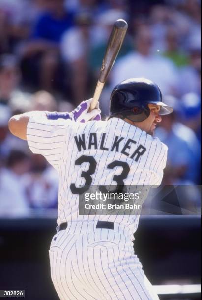 Larry Walker of the of the Colorado Rockies in action during a game against the Houston Astros at Coors Field in Denver, Colorado. The Rockies...