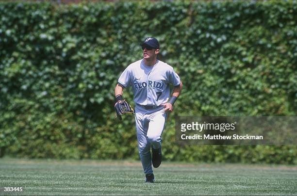 Mark Kotsay of the Florida Marlins in action during a game against the Chicago Cubs at Wrigley Field in Chicago, Illinois. The Cubs defeated the...