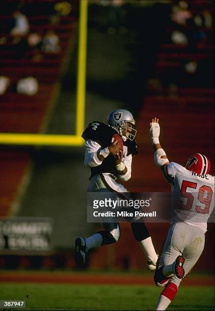 Running back Bo Jackson of the Los Angeles Raiders in action during a game against the Atlanta Falcons at the Memorial Coliseum in Los Angeles,...
