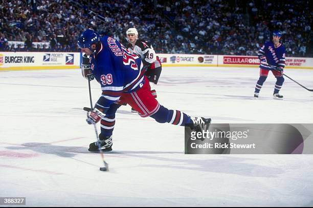 Center Wayne Gretzky of the New York Rangers in action during a game against the Buffalo Sabres at the Marine Midland Arena in Buffalo, New York. The...