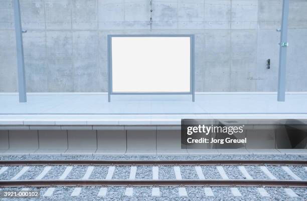 billboard in railroad station - railway station stock pictures, royalty-free photos & images