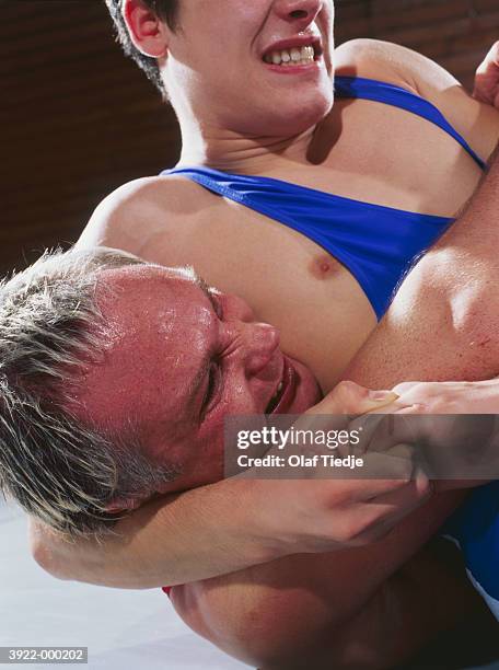 two wrestlers fighting - headlock stock pictures, royalty-free photos & images