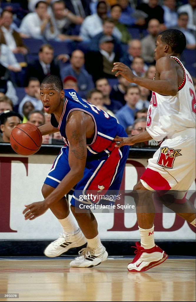 Bobby Simmonds Bobby Simmons of the De Paul Blue Demons dribbles as Steve Francis of ...