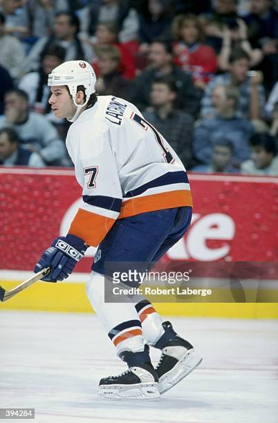 Scott Lachance of the New York Islanders skates during the game against the Montreal Canadiens at the Molson Centre in Montreal, Quebec, Canada. The...