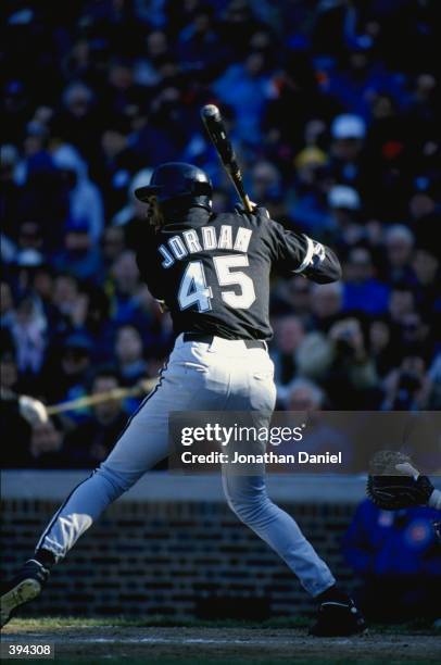 Michael Jordan of the Chicago White Sox bats during a spring training game against the Chicago Cubs on April 7, 1994 at Wrigley Field in Chicago,...
