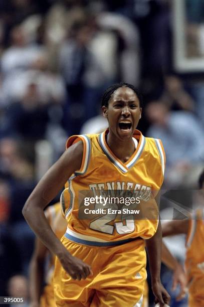 Chamique Holdsclaw of the Tennessee Lady Volunteers yelling in celebration of making the shot during the game against the UConn Huskies at the Harry...