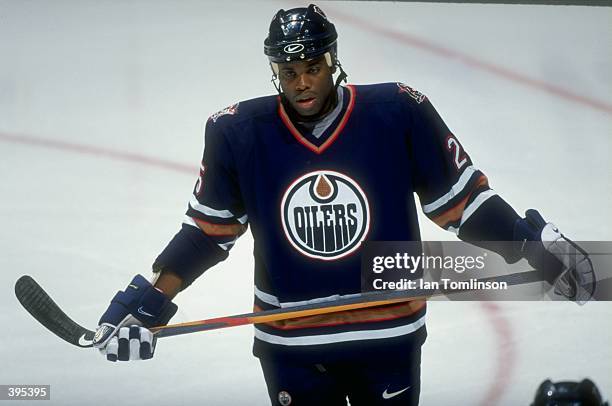 Rightwinger Mike Grier of the Edmonton Oilers in action during the game against the Calgary Flames at the Canadian Airlines Saddledome in Calgary,...