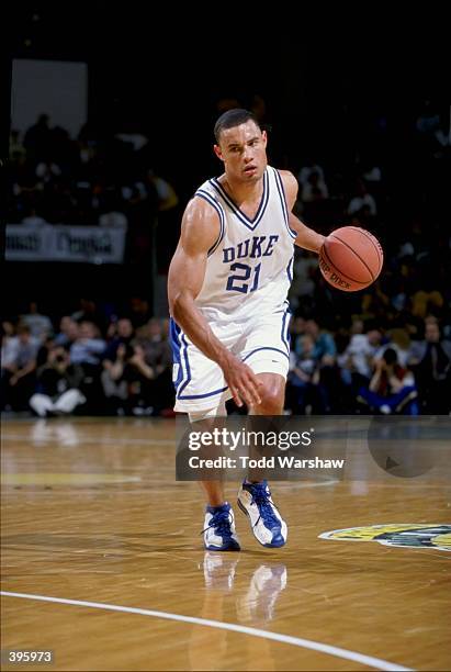 Trajan Langdon of the Duke Blue Devils in action during the Carrs Great Alaska Shootout Game against the Cincinnati Bearcats at the Sullivan Arena in...