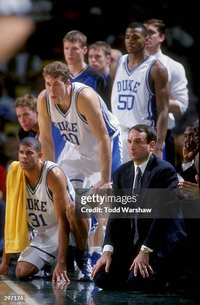 Head coach Mike Krzyzewski of the Duke Blue Devils looks on during the Carrs Great Alaska Shootout Game against the Cincinnati Bearcats at the...