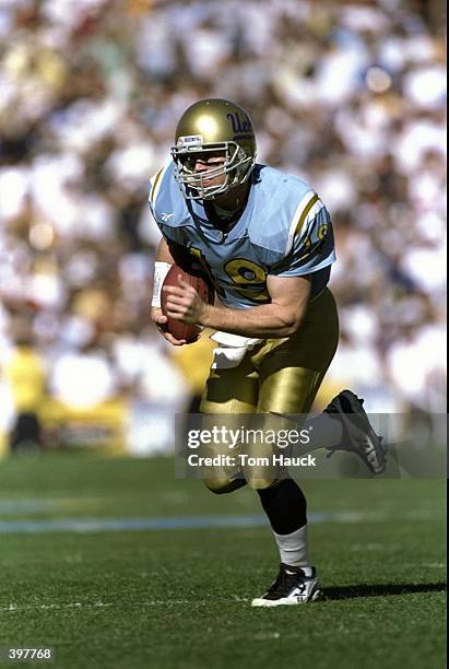 Quarterback Cade McNown of the UCLA Bruins in action during the game against the USC Trojans at the Rose Bowl in Pasadena, California. The Bruins...