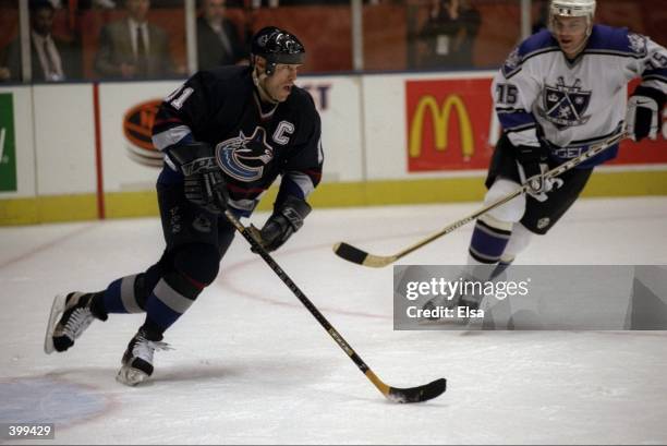 Mark Messier of the Vancover Canucks skates during a game against the Los Angeles Kings at the Great Western Forum in Inglewood, California. The...