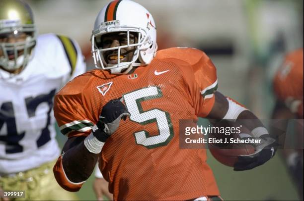 Running back Edgerrin James of the University of Miami Hurricanes in action during the game against the UCLA Bruins at the Orange Bowl in Miami,...