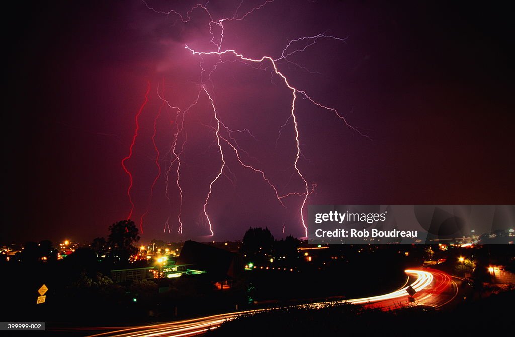 Lightning storm over cityscape