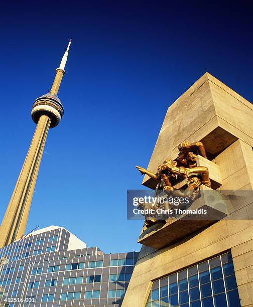 canada, toronto, skydome, michael snow's sculpture, cn tower behind - cn tower stock pictures, royalty-free photos & images