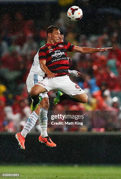 Brendon Santalab of the Wanderers jumps to head the ball during the round six A-League match between the Western Sydney Wanderers and the Melbourne...