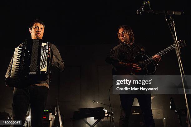 Jerome Fontamillas and Drew Shirley of Switchfoot perform on stage in front of a sold out crowd at The Moore Theater on November 15, 2013 in Seattle,...
