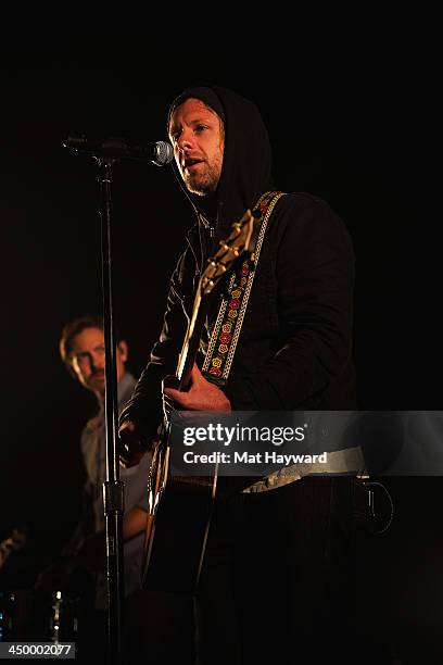 Chad Matthew Butler and Jon Foreman of Switchfoot perform on stage in front of a sold out crowd at The Moore Theater on November 15, 2013 in Seattle,...