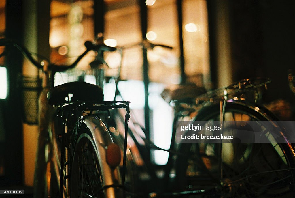 Two bikes at night