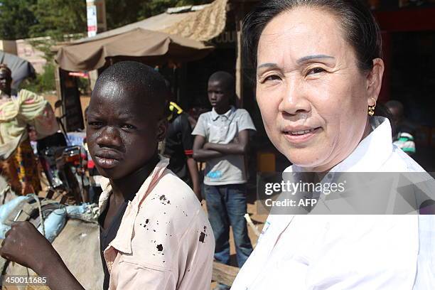 Chinese born Malian Yu Hong Wei, also known as Astan Coulibaly, is pictured on November 14, 2013 in Segou where she is candidate for the upcoming...