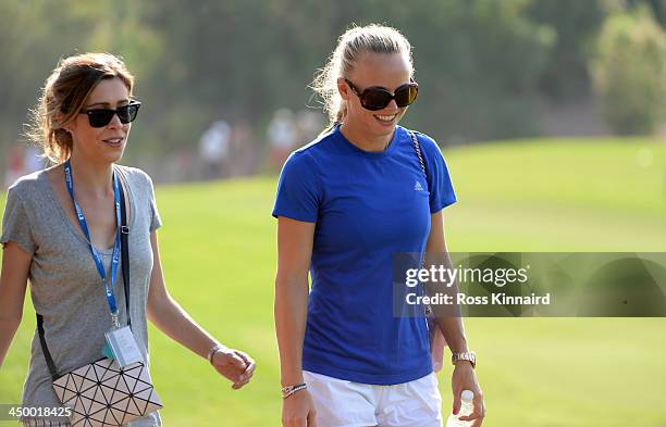 Valentina Molinari, wife of Francesco Molinari and Tennis star, Caroline Wozniacki of Denmark watching the action during the third round of the 2013...