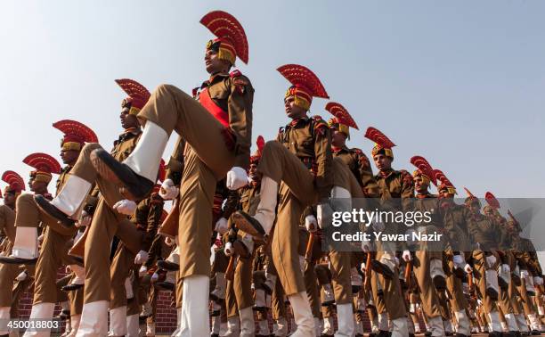 Indian Border Security Force soldiers march during their passing out parade on November 16, 2013 in Humhama, on the outskirts of Srinagar, the summer...